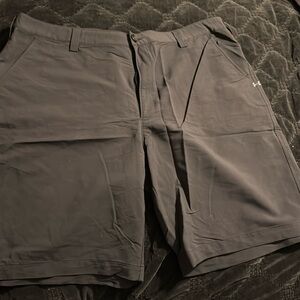 Under Armour black shorts size 42.